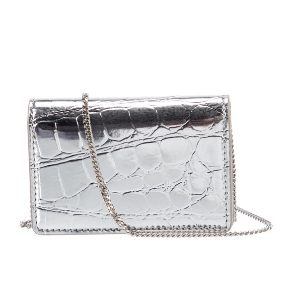 Burberry Wristlet
•   Silver
•   Animal Print
•   Silver-Tone - Picture 3 of 8
